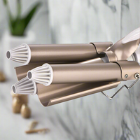 Triple barrel curling iron with water wave effect