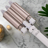Triple barrel curling iron with water wave effect